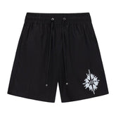 AMIRI Starburst logo shell swim shorts